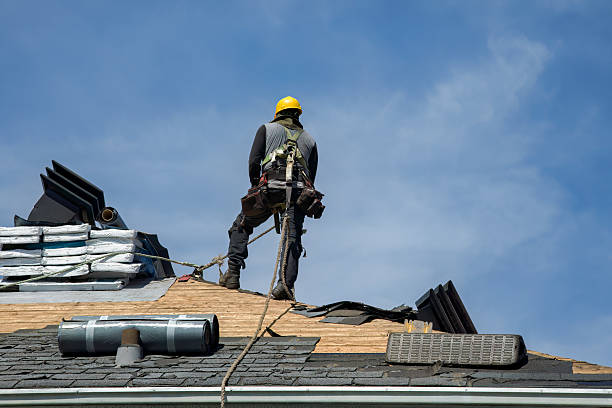 Professional Roofing technician working in Fowler, CA